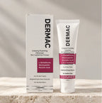 DERMAC Creamy Foaming Cleanser 100ml carton and tube by DERMNEST on a stone surface