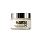 Marked 10 cream in a frosted glass jar with silver lid